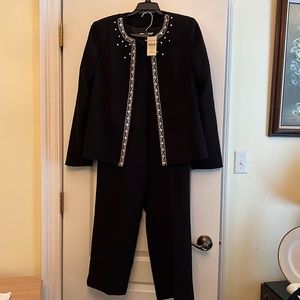 Black Coldwater Creek pantsuit size 12 with original tag, no pockets